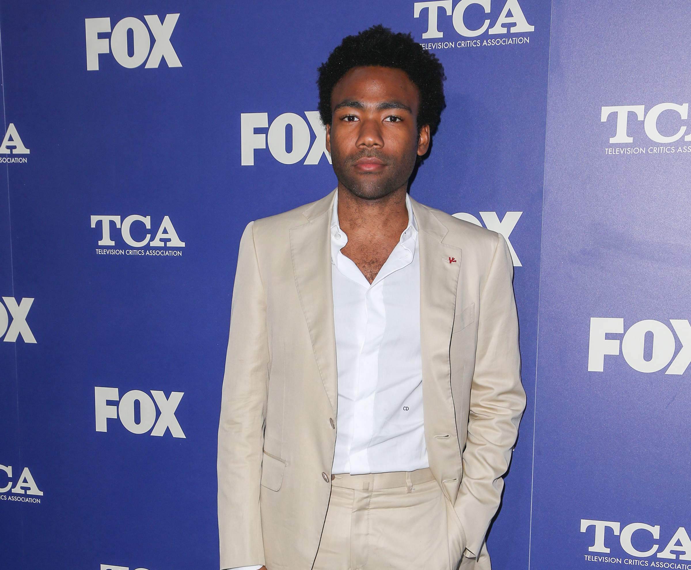 08/08/2016 - Donald Glover - 2016 Summer TCA Tour - Fox Press Tour - Arrivals - The Beverly Hilton Hotel, 9876 Wilshire Boulevard - Los Angeles, CA, USA - Keywords: Vertical, Radio, Theatrical Performance, Social Event, Television Show, TV Show, Arrival, Portrait, Photography, Red Carpet Event, Annual Event, Arts Culture and Entertainment, Celebrity, Celebrities, Television Critics Association Awards, Person, People, California Orientation: Portrait Face Count: 1 - False - Photo Credit: PRPhotos.com - Contact (1-866-551-7827) - Portrait Face Count: 1