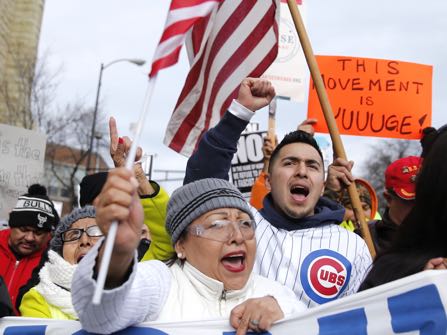 Protesters participate in a march aimed squarely at President Donald Trump's efforts to crack down on immigration Thursday, Feb. 16, 2017, in Chicago. Immigrants around the country have been staying home from work and school today, hoping to demonstrate their importance to America's economy and its way of life. (AP Photo/Charles Rex Arbogast)