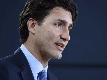 Canada's Prime Minister Justin Trudeau holds a press conference at the National Press Theatre in Ottawa, Ontario, on Tuesday, Nov. 29, 2016. Trudeau has approved one controversial pipeline from the Alberta oil sands to the Pacific Coast, but rejected another. On Tuesday, he approved Kinder Morgan's Trans Mountain pipeline to Burnaby, British Columbia, but rejected Enbridge's Northern Gateway pipeline to Kitimat, B.C. (Sean Kilpatrick/The Canadian Press via AP)
