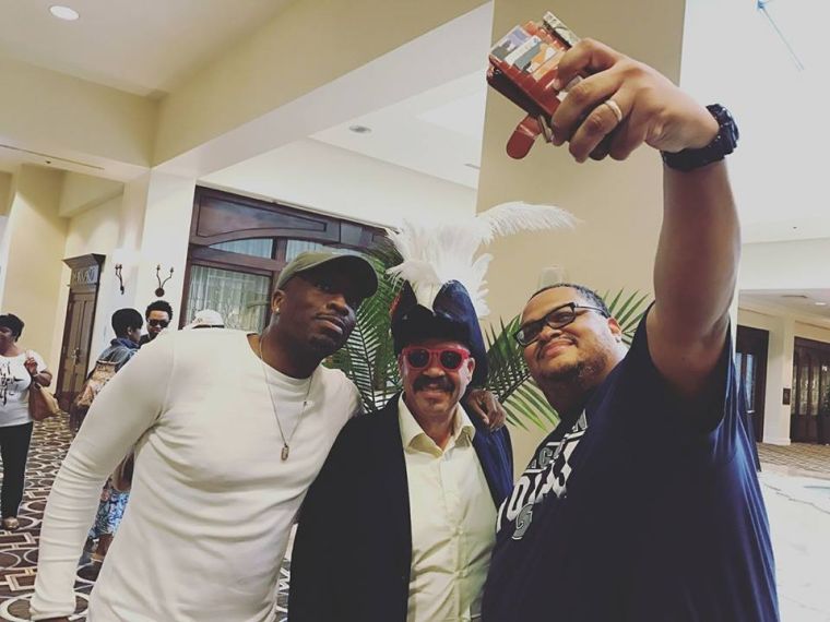 Tom Joyner takes an us-ie.