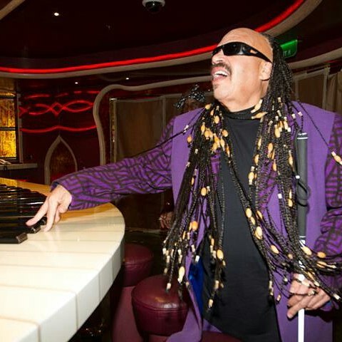 He’s a little light-skinned but we guess he can rep Stevie Wonder.