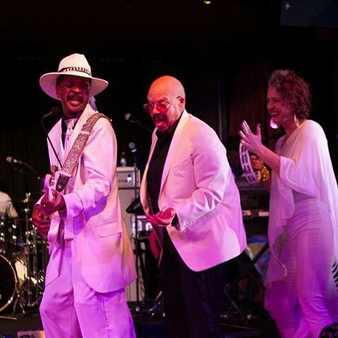 Tom gets down with Larry Graham.