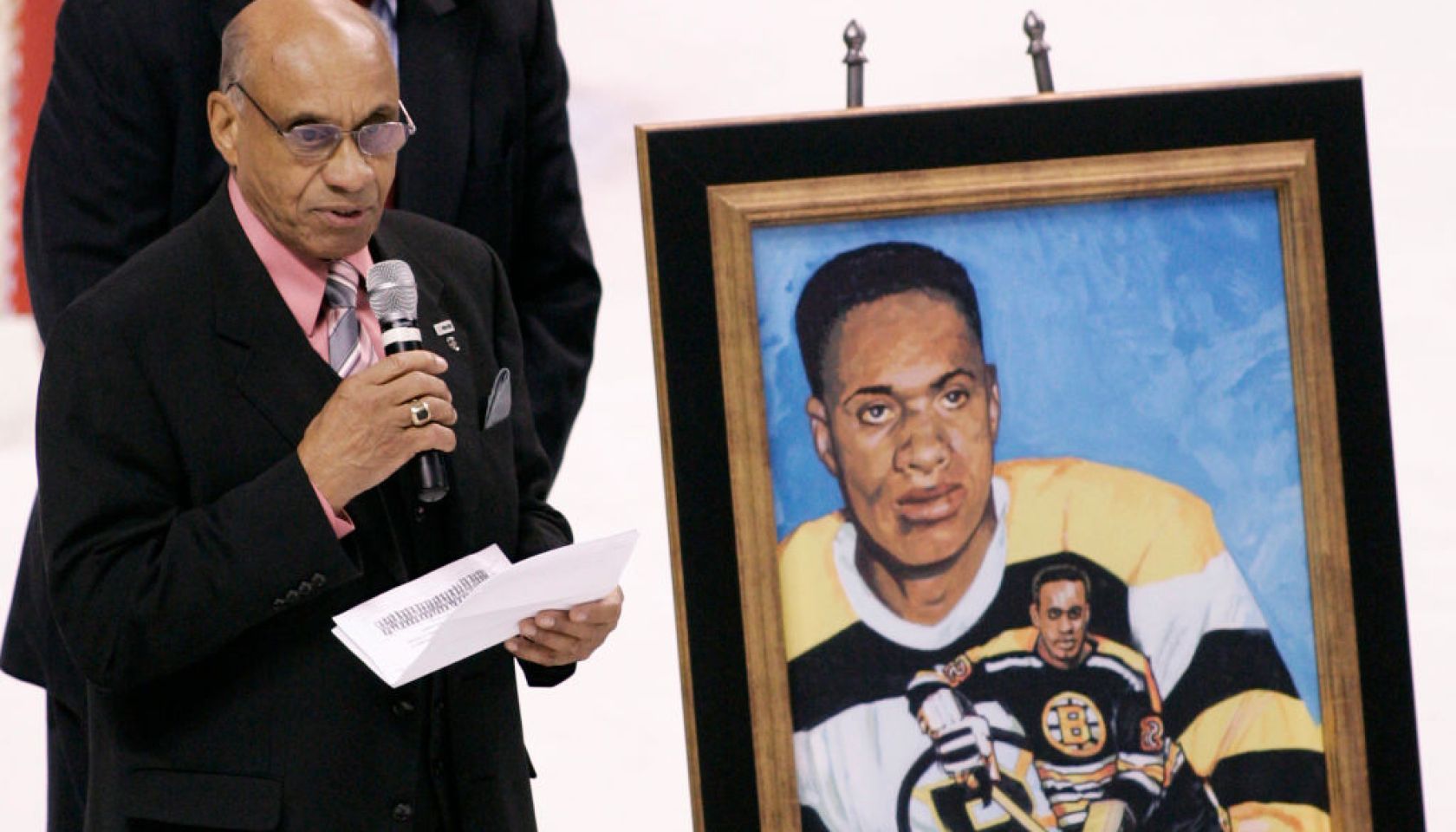 (011908 Boston, MA) Former Boston Bruin and the first African-American player to play in the NHL Willie O'Ree speaks after he was honored by NHL and the Bruins during the first intermission of the Bruins game against the New York Rangers on Saturd