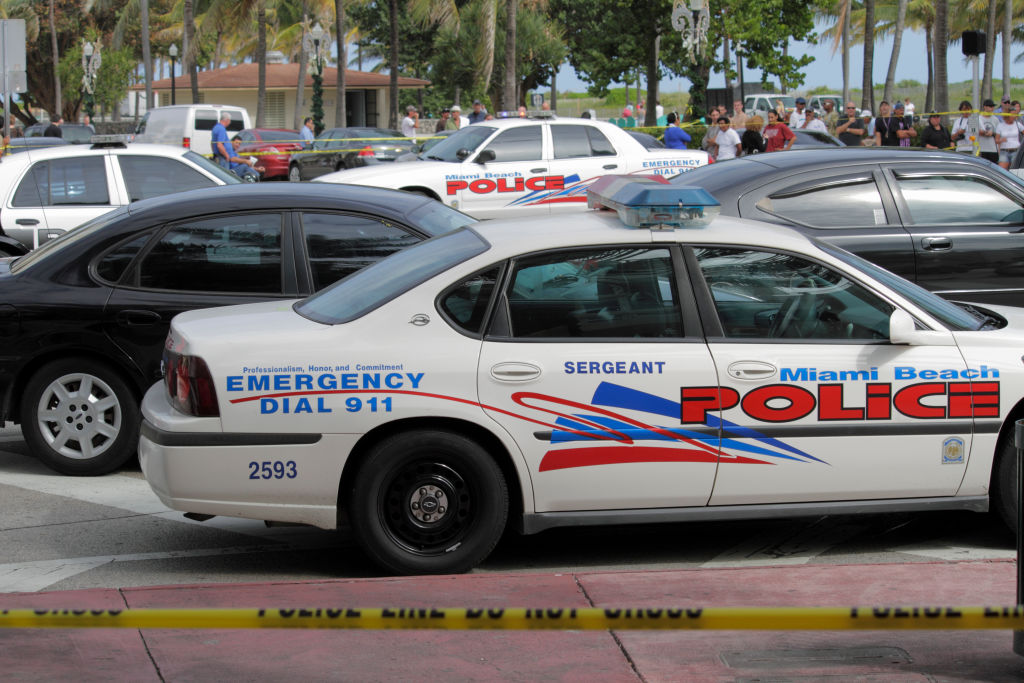 Policecars at a shooting crime scene on Ocean Drive.