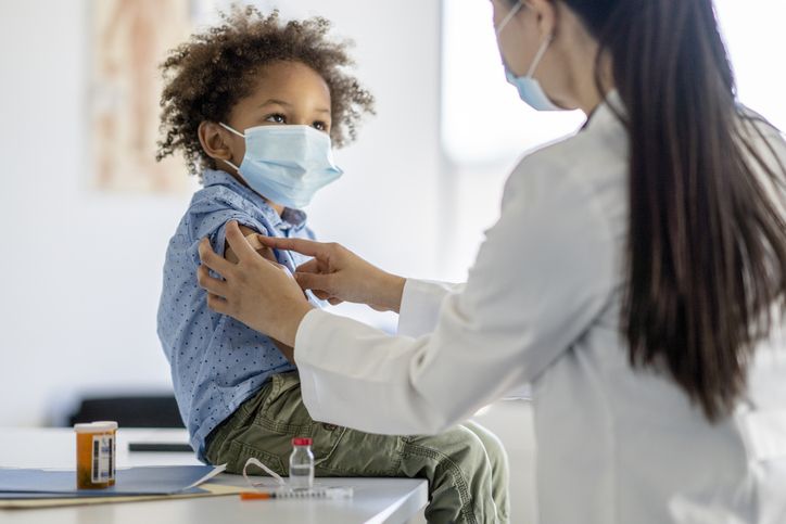 Boy Receiving a Vaccination During a Pandemic