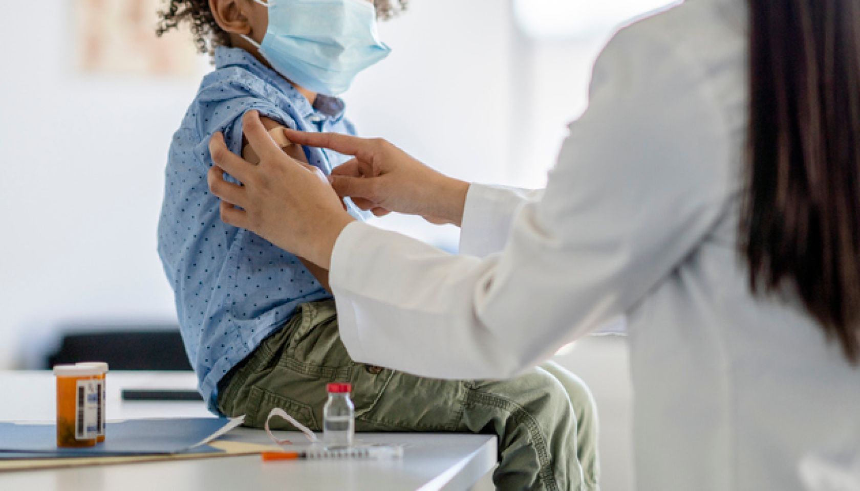 Boy Receiving a Vaccination During a Pandemic