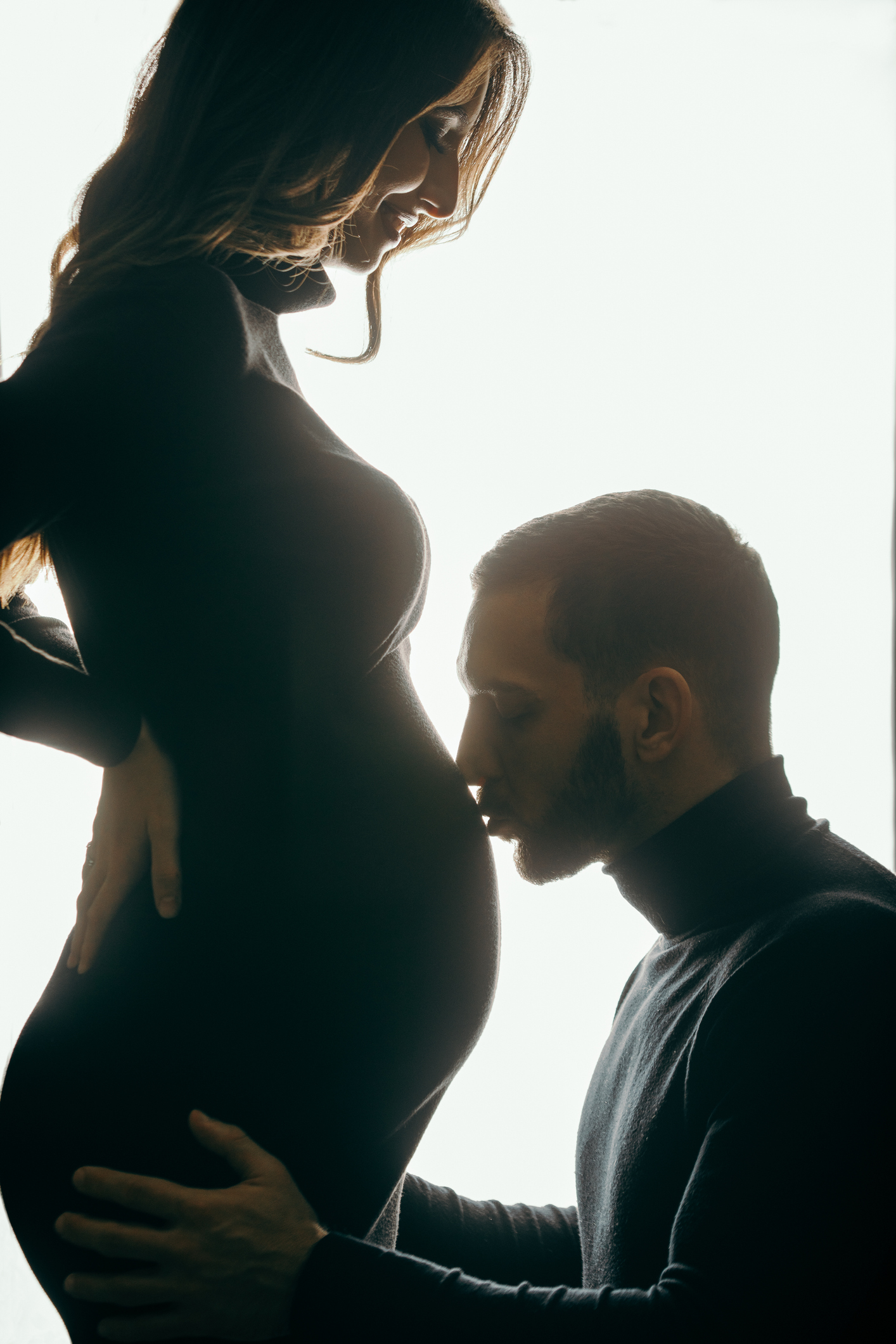 Portrait of young couple where woman is pregnant