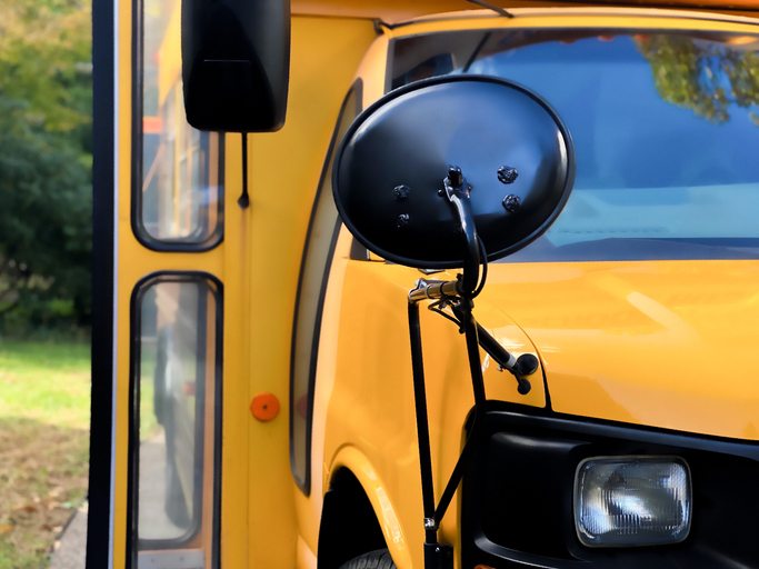 front view of traditional yellow school bus