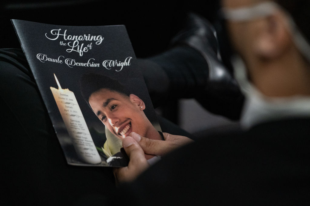 Family member and community members attend a public viewing viewing service of Daunte Wright