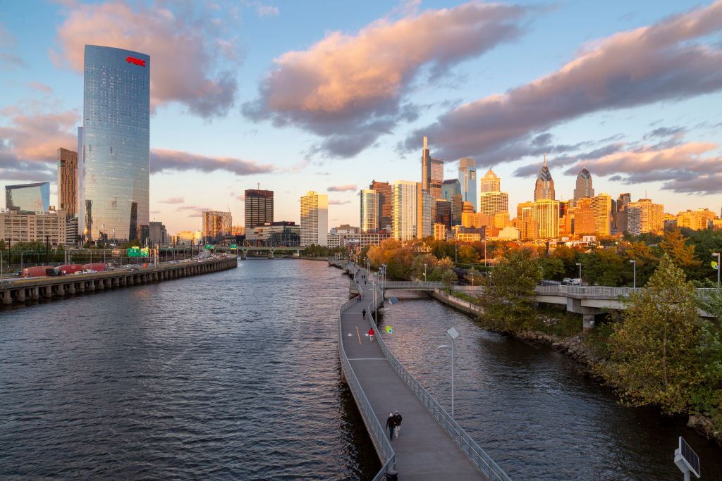 Skyline in autumn behind the Schuylkill River Boardwalk at Sunset, Philadelphia, Pennsylvania, USA