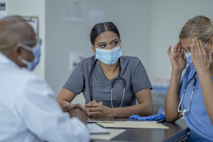Medical Team Meeting During a Pandemic