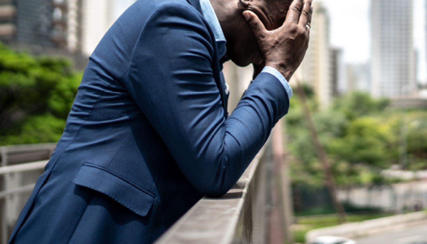Worried / Hopelessness mature businessman at bridge