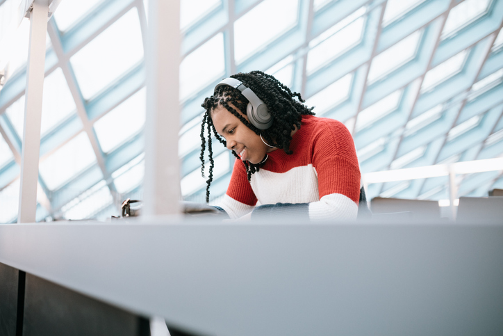 Student Researching and Studying at Library