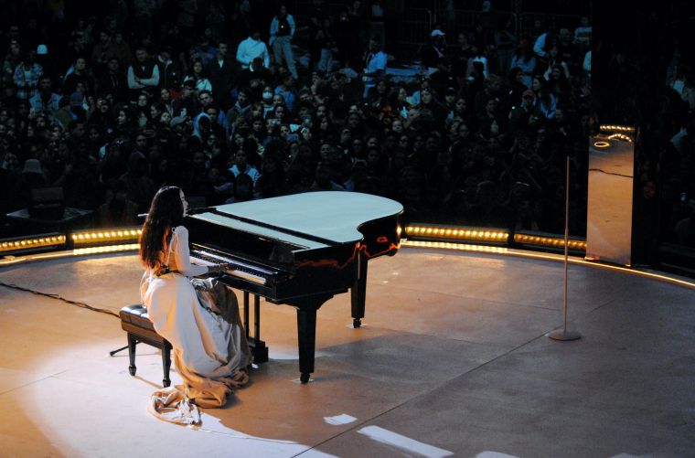 Latin pop star Rosalía performing on the eve of her 30th birthday