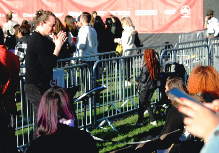 ASL Translator for ADA helping hearing-impaired attendees enjoy the show