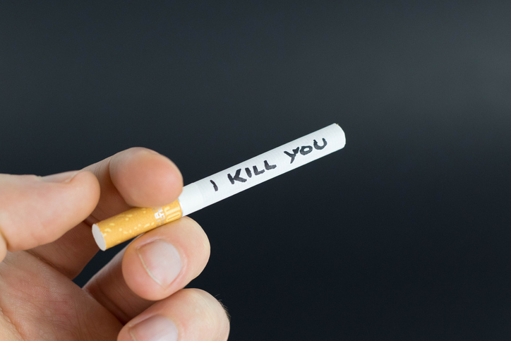 Man holding a cigarette