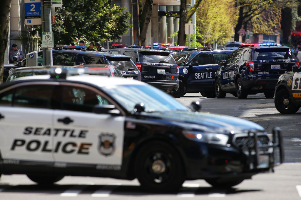 Officers respond after two Seattle Police Department officers were shot while responding to a robbery in downtown Seattle on Thursday, April 20, 2017. (Genna Martin, seattlepi.com)