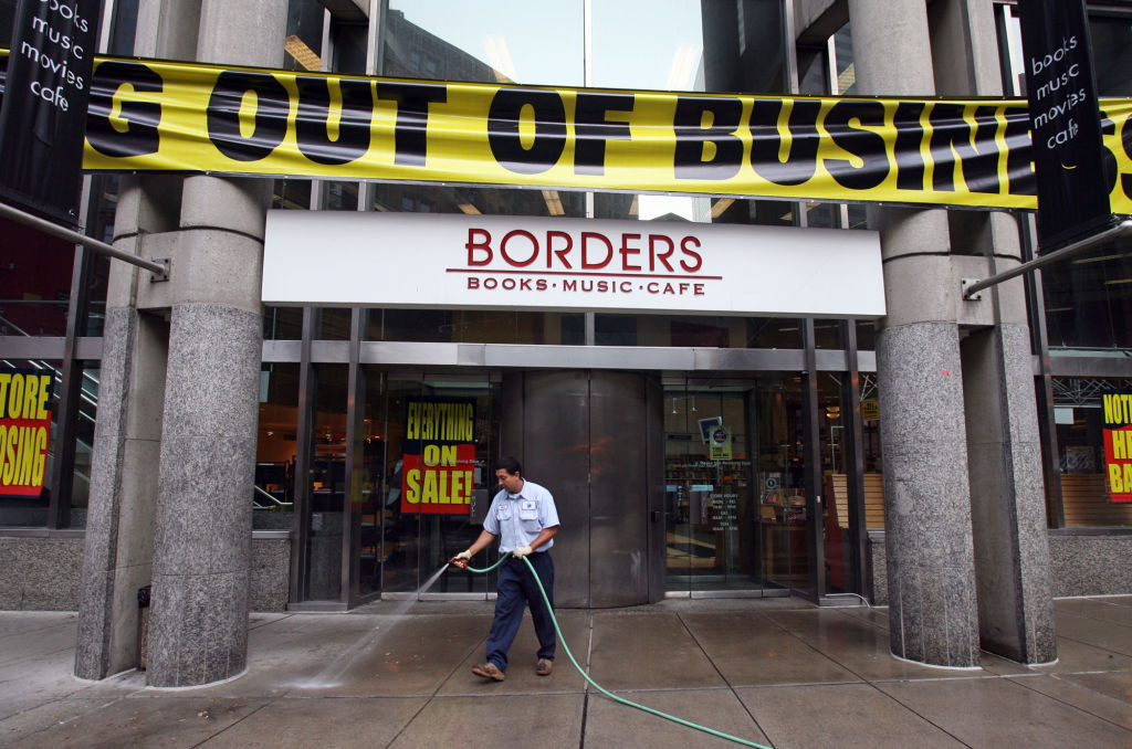 Workers ready the Downtown crossing Borders Books building today, July 22, 2011, for the start of a liquidation sale. Staff photo by Mark Garfinkel