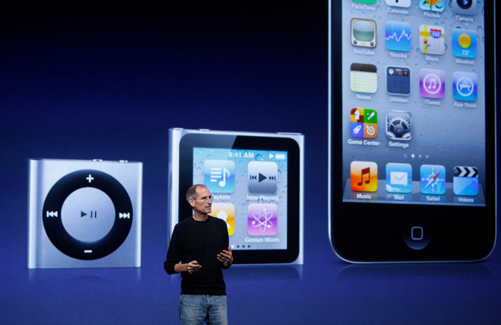 Apple CEO Steve Jobs shows off the newsest version of the iPod Shuffle (left), Nano (center) and Touch (right) at the Yerba Buena Center for the Arts in San Francisco, Calif. on Wednesday, Sept. 1, 2010