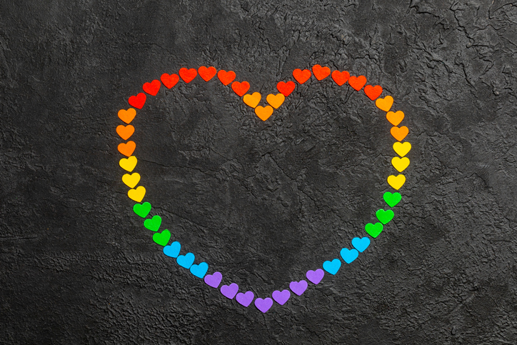 Rainbow heart on a black background. Hearts in the colors of the LGBT flag