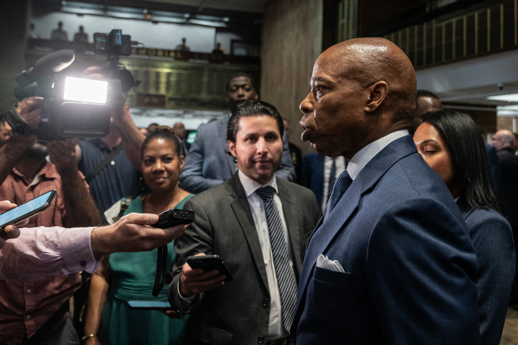 Mayor Eric Adams speaks with press on the visit by the...