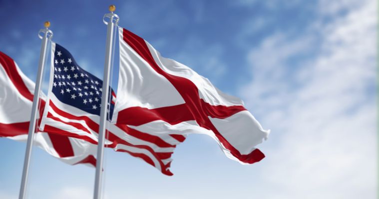 Alabama Town Elected Its First Black Mayor, But White Residents Took His JobFlags of Alabama and the United States waving together