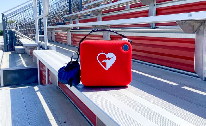 A life saving AED difibrillator in the bleachers