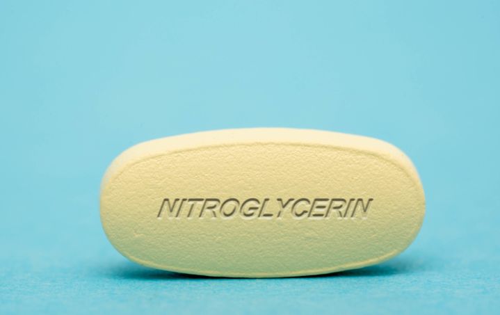 Nitroglycerin pill, conceptual image