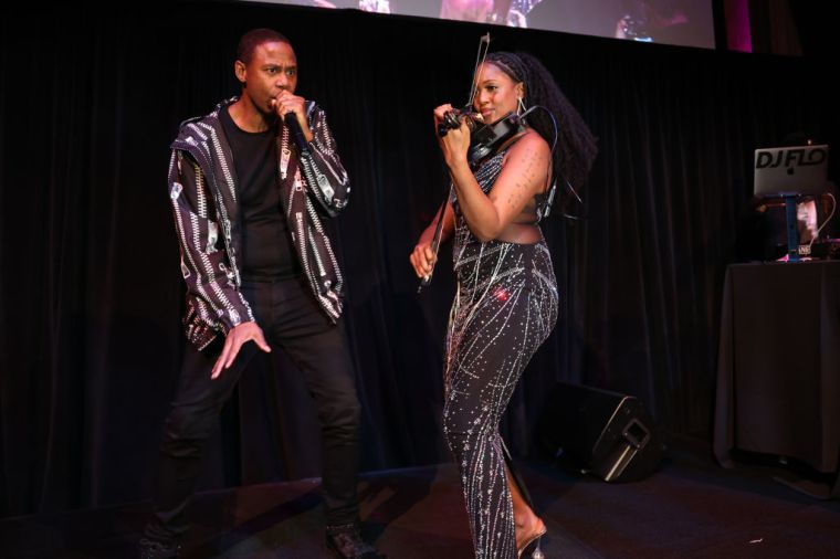 (L to R) Doug E. Fresh performs alongside very talented violinist Bri Blvck