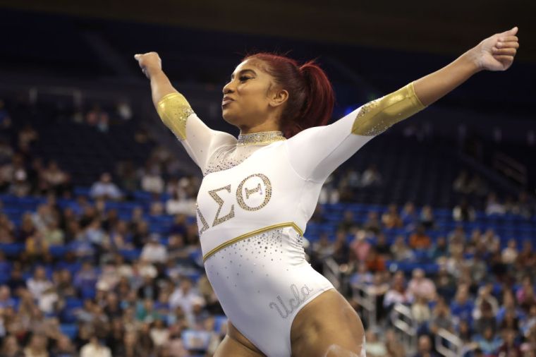 UCLA Gymnast Nya Reed Reps for Delta Sigma Theta and Divine 9 During Performance