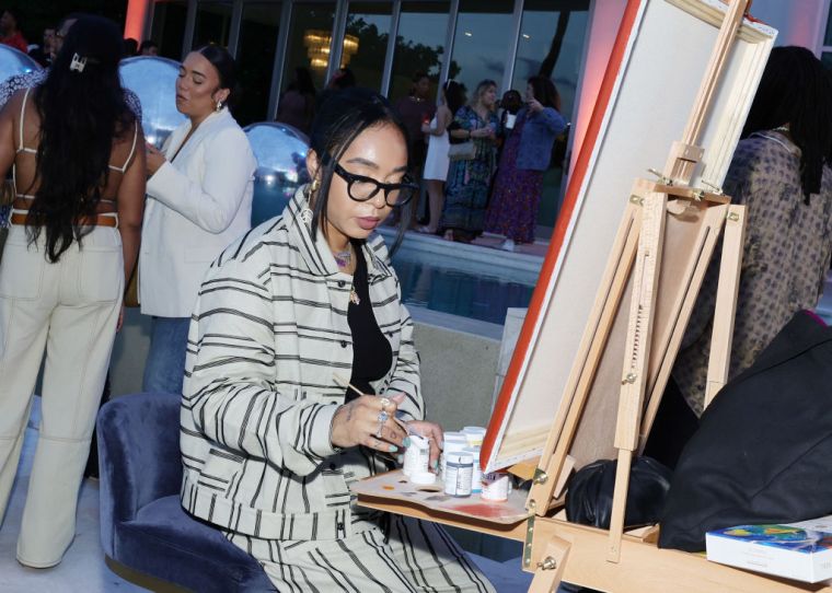 Cristina "Sew Trill" Martinez working on live art at the Meta Sonic Listening Party