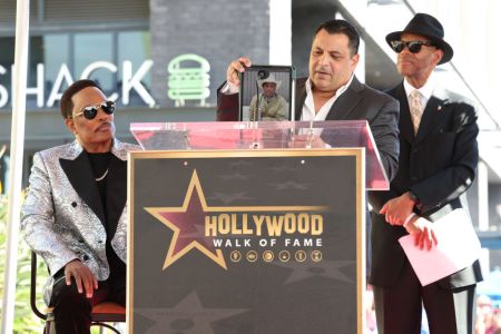 Pharrell Williams joins via an iPad at Charlie Wilson's Hollywood Walk of Fame ceremony