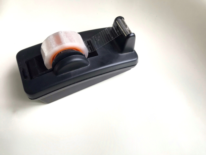 Scotch tape tool on white background