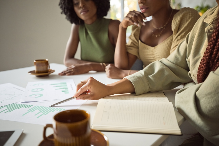 Three female designers working together in the office