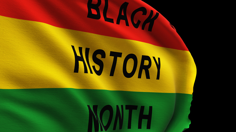 Close up of waving black history month flag