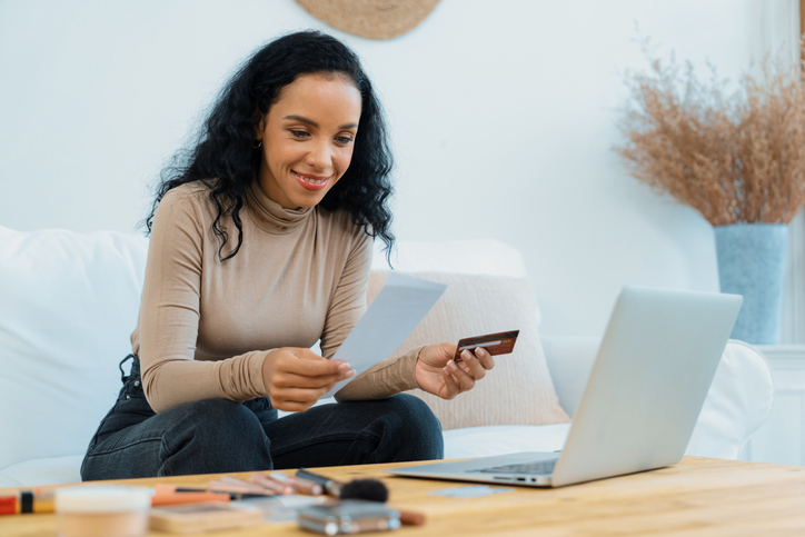 Young happy woman buy product by online shopping with crucial security