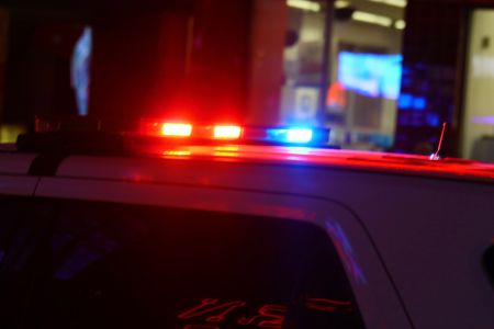 Nightime Police Traffic Stop in the urban community