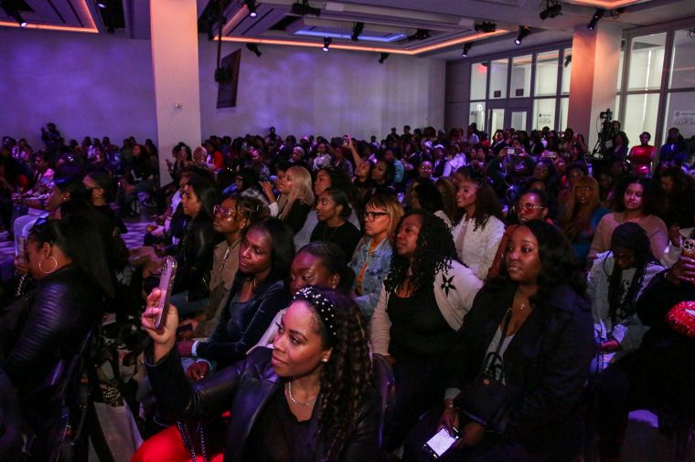 Attendees enjoying the gems being dropped at Mary J. Blige's 'Strength Of A Woman' 2024 Festival & Summit