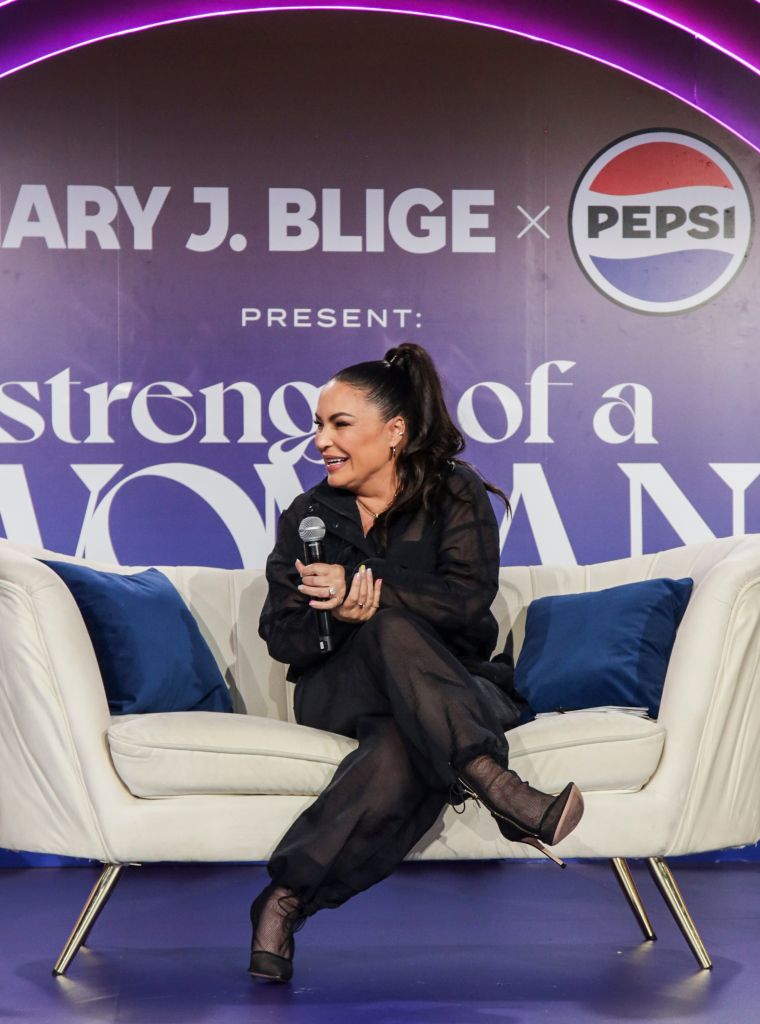 Angie Martinez moderates the 'Girl Talk' panel
