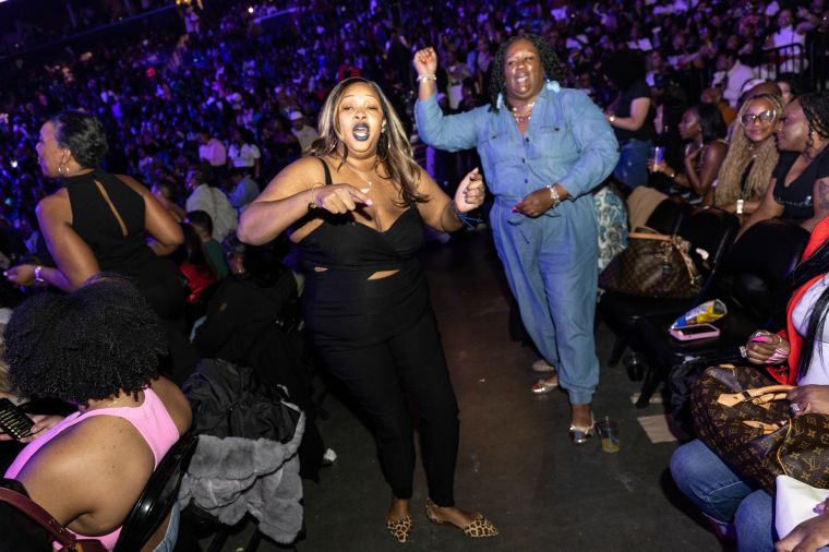 Attendees enjoying the Mary J. Blige 'Strength Of A Woman' 2024 Festival & Summit Concert