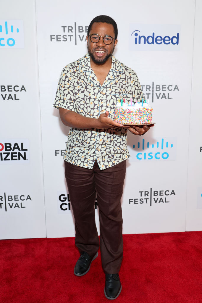 DAY 1: Ikechukwu Ufomadu arrives with cake at 'The French Italian' premiere