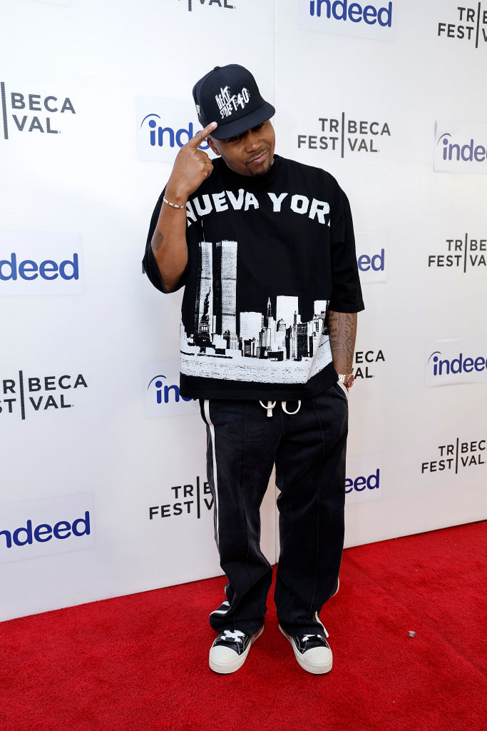 DAY 9: Nas poses for pics at the 'Beat Street' 40th Anniversary screening