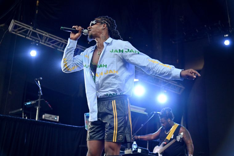 Self-proclaimed "active and attractive" host Gitoo keeping the crowd entertained