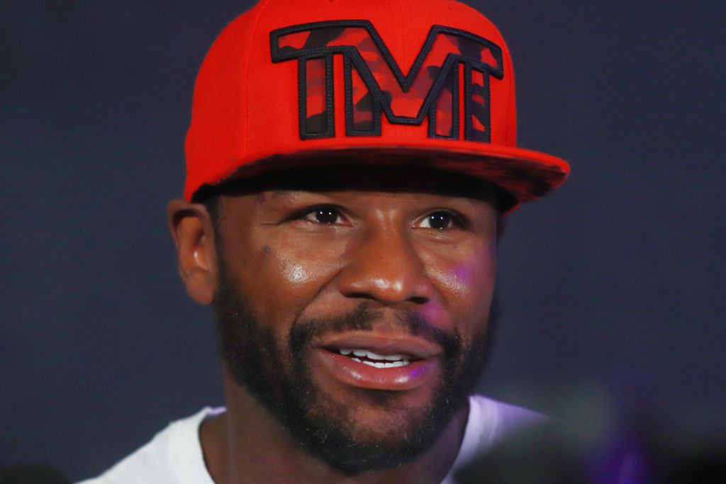 Floyd Mayweather Jr. attends the scales during the...