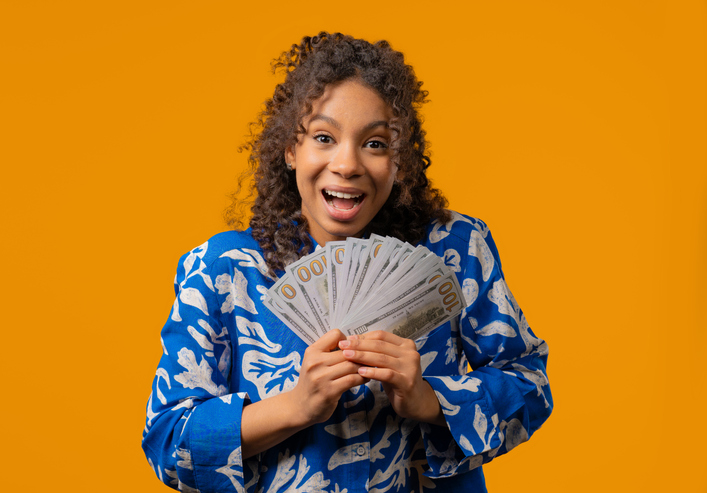 Rich Young Teen Girl With Money.Smiling Luck woman Praised Usd Dollars Banknotes