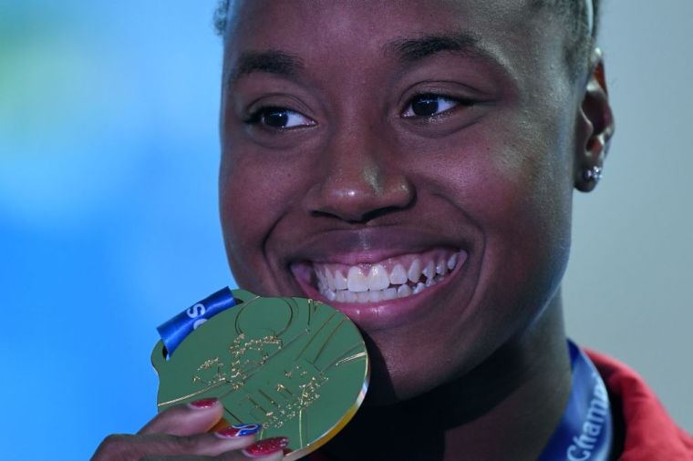 Simone Manuel (2016): First Black woman to win individual Olympic swimming gold.