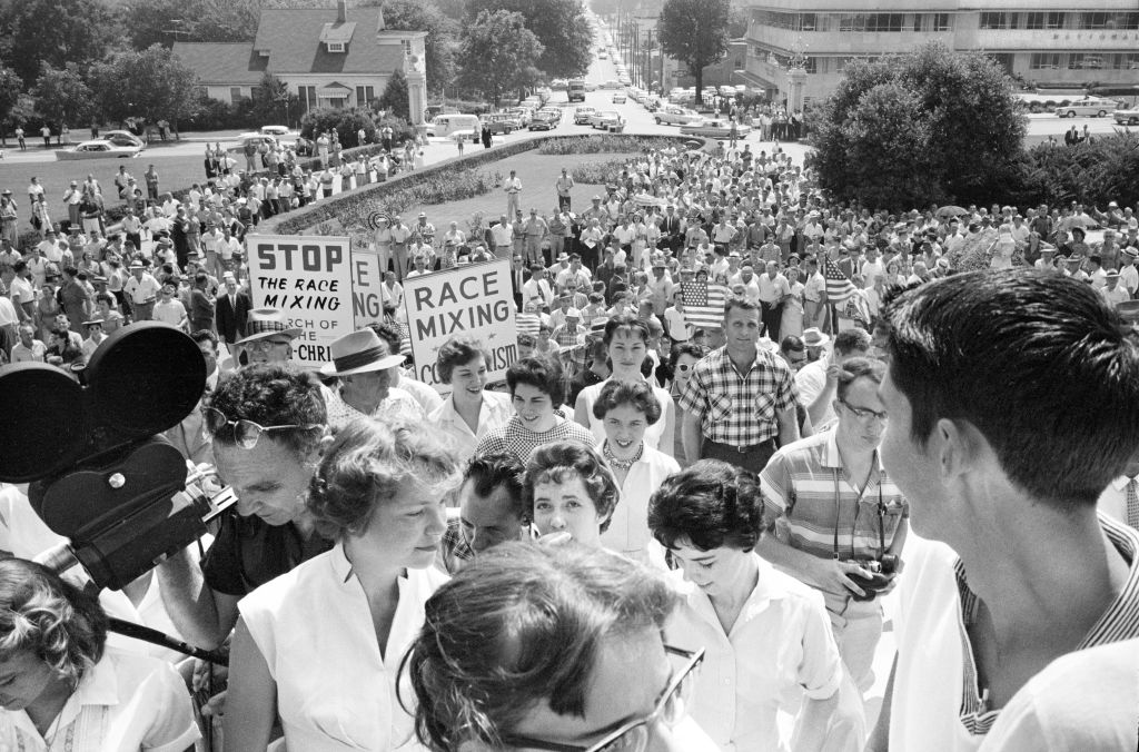 Crowd at Arkansas State Capitol protesting integration of Central High School, with signs reading "Race mixing is Communism" and "Stop the race mixing," Little Rock, Arkansas, USA, John T. Bledsoe, U.S. News & World Report Magazine Photograph Collection,