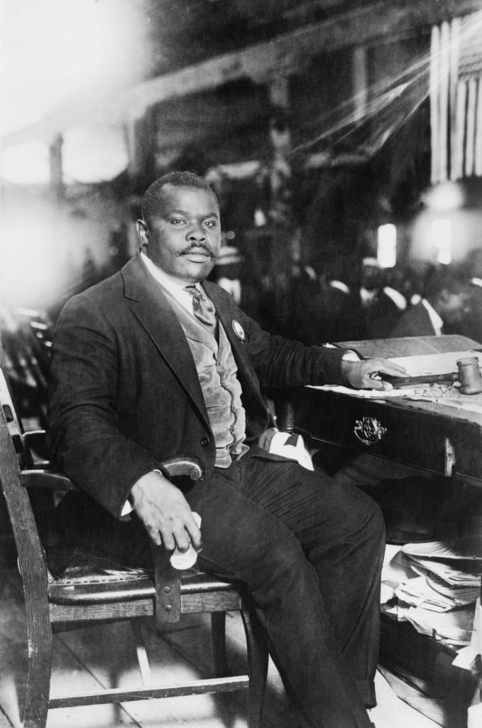 Marcus Garvey (1887-1940), Jamaican-Born Activist, Political Leader, Publisher, Entrepreneur and Proponent of Black Nationalism and Pan-Africanism Movements, Full-length Portrait seated at Desk, Bain News Service, 1924