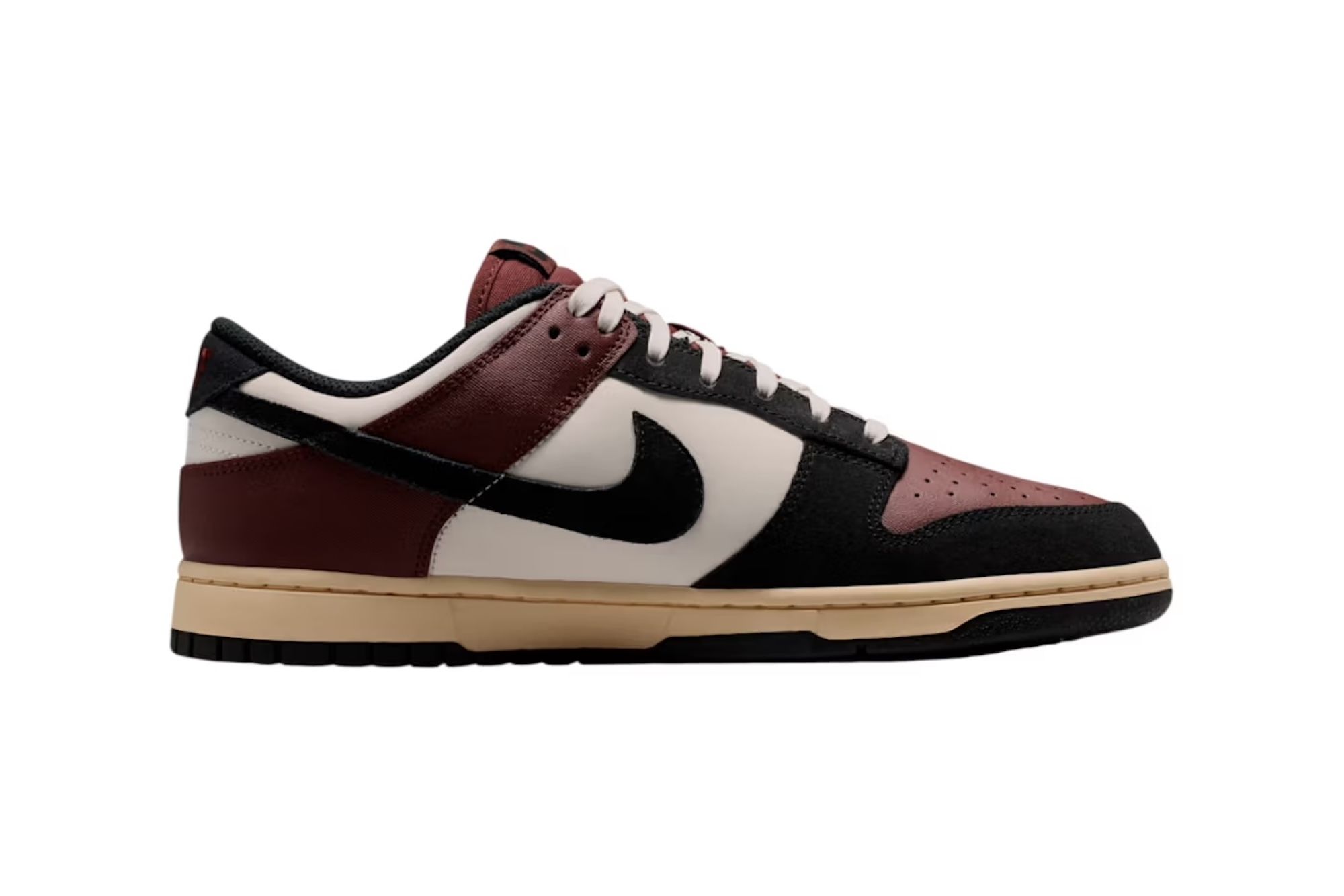 A pair of burgundy and black Nike Dunk Low sneakers with a white midsole and gum rubber outsole.