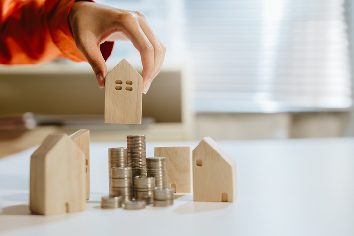 Saving money concept. Home investment saving house coin mortgage finance money property concept